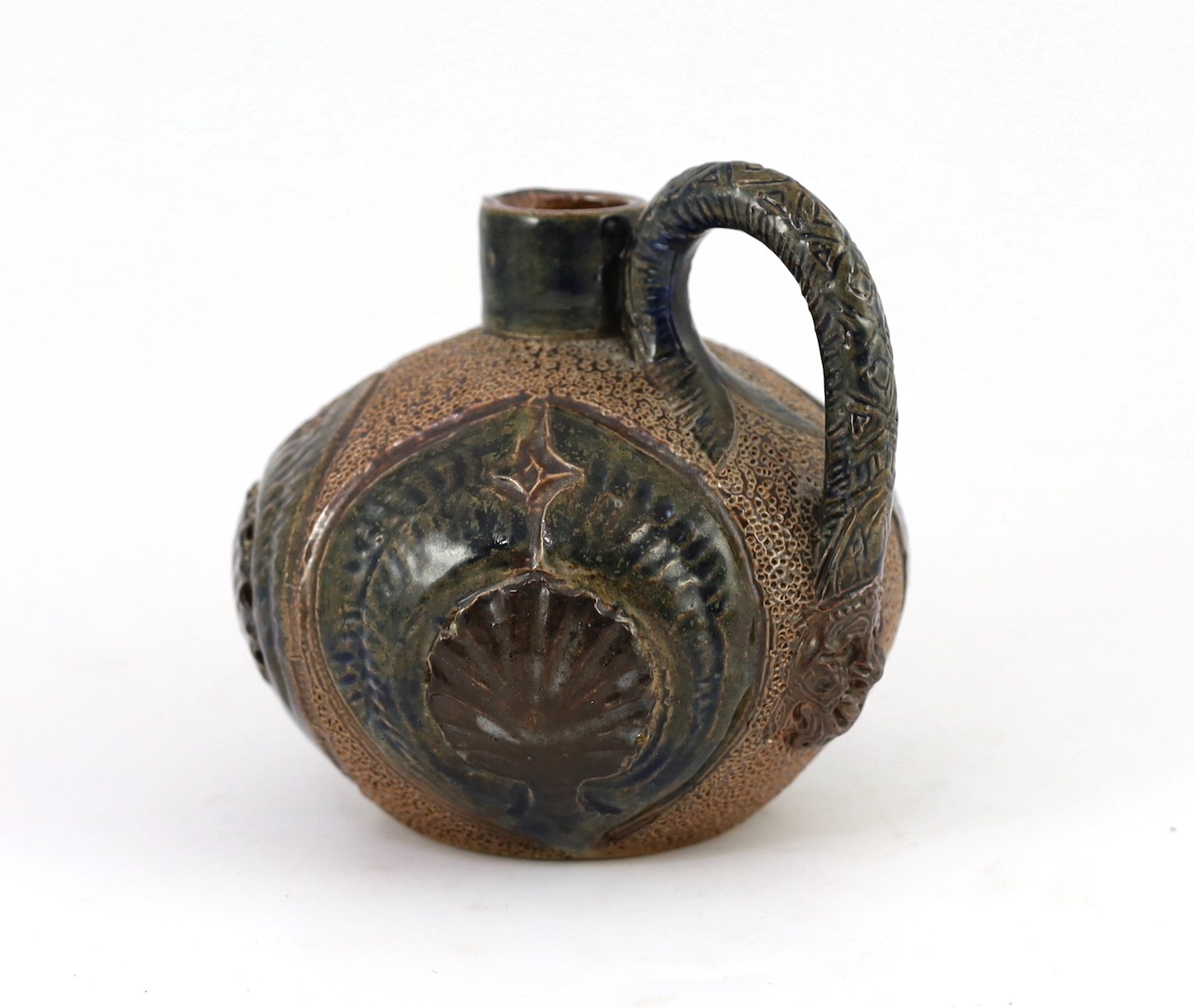 A Martin Brothers stoneware jug, c.1879, 14cm high